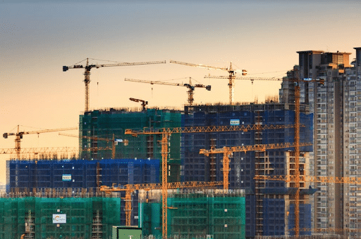 Cranes at dusk to show commercial real estate development
